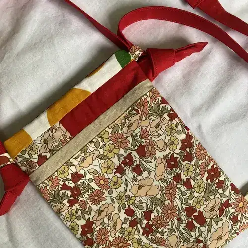 Upcycled patchwork phone bag in crimson