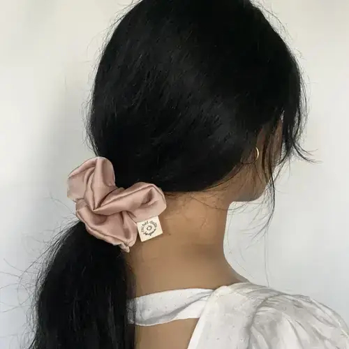 Blossom satin scrunchie worn in hair